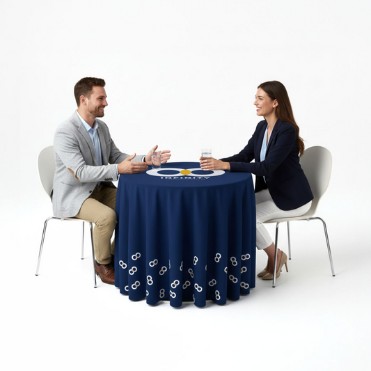 GoVizly custom round table cover at standard 28" height displayed at a corporate event with branded logo and seated professionals